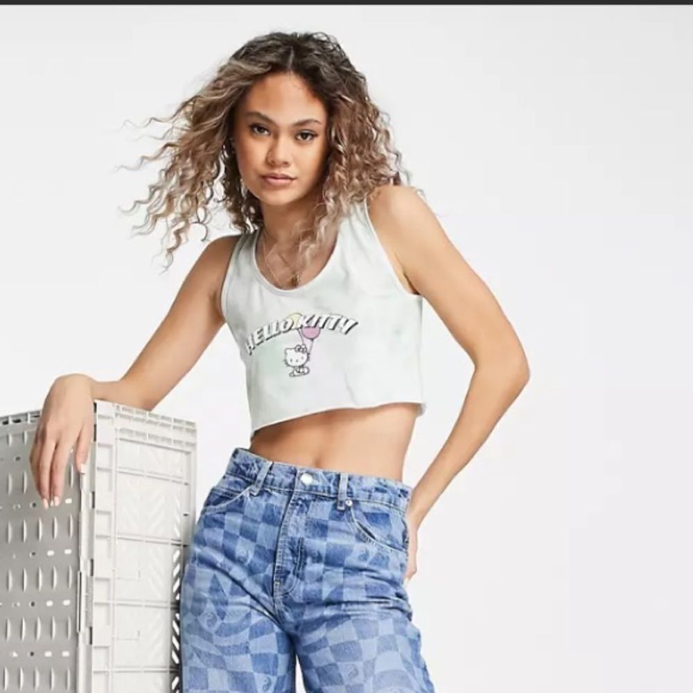 New Girl Order at Dolls Kill Sanrio Hello Kitty Cropped Tank Top